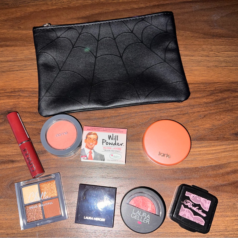 Makeup bag and Makeup Minis including Clinique Black Cherry.